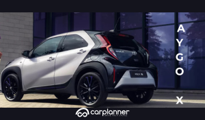 Test consumi reali Toyota Aygo X con display computer di bordo che mostra il consumo istantaneo